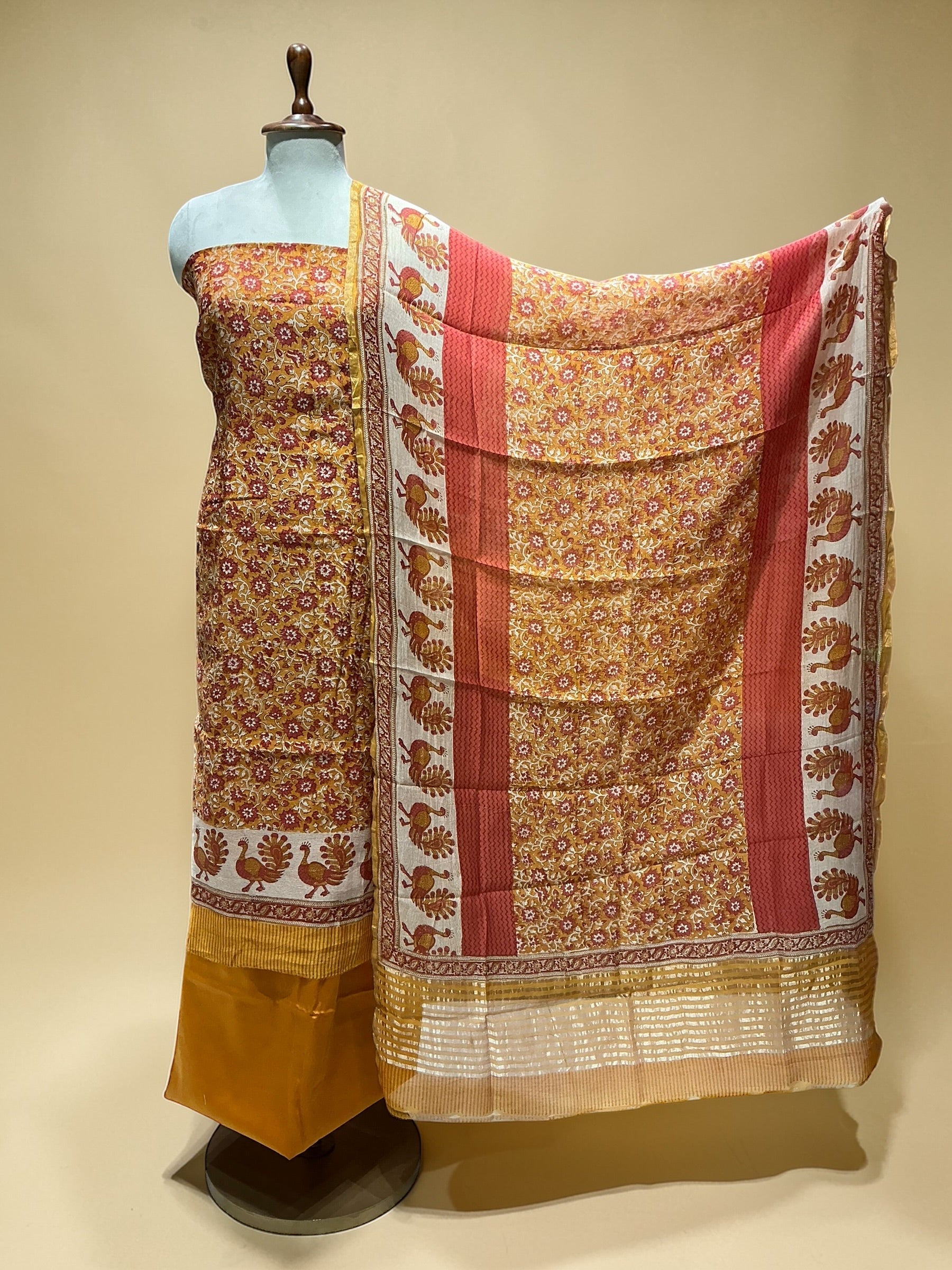 MUL CHANDERI SUIT IN BEAUTIFUL PRINTS